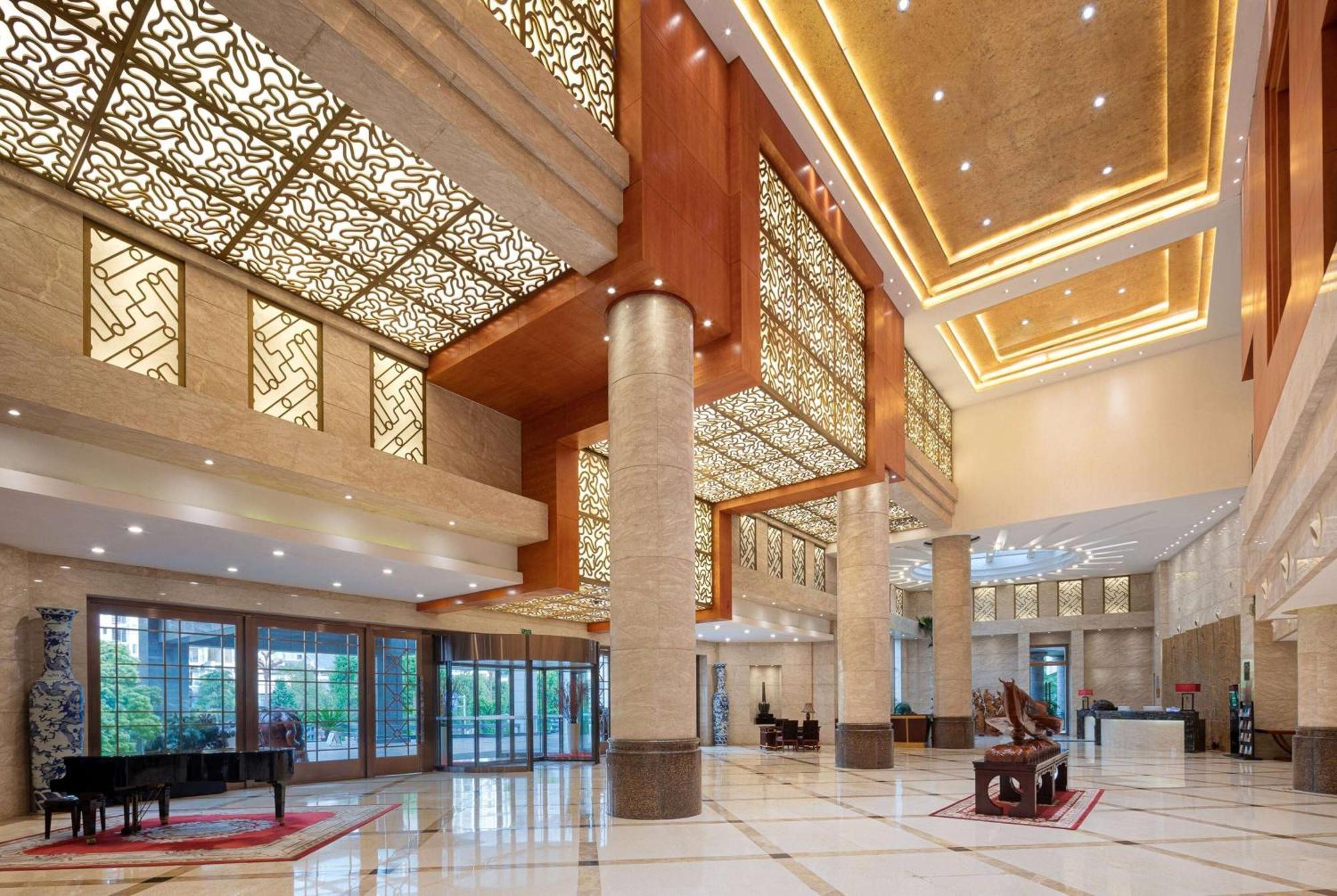 Ramada Plaza By Wyndham Chongqing West Hotel Bagian luar foto