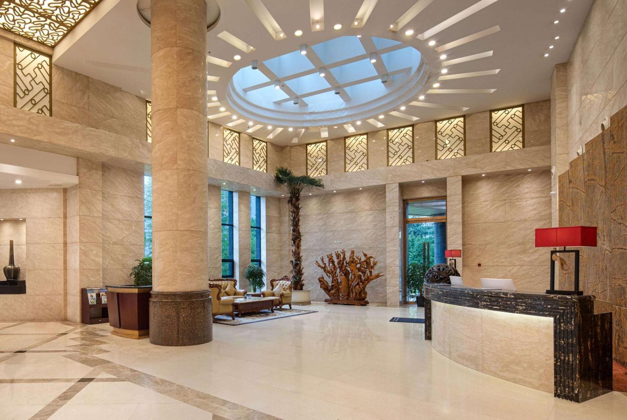 Ramada Plaza By Wyndham Chongqing West Hotel Bagian luar foto